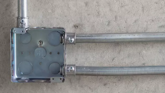 Metal junction box with multiple EKOs
