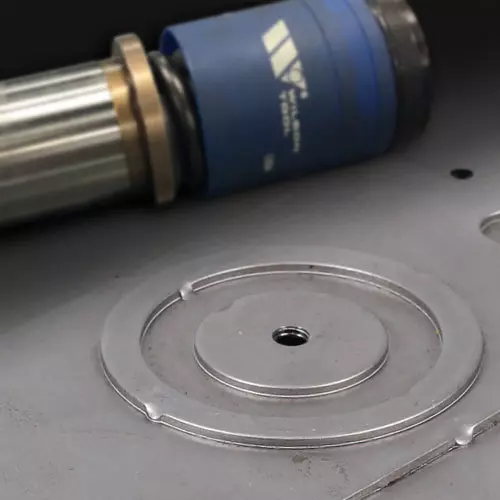 EKO Tooling on EKO metal sample dramatic lighting image