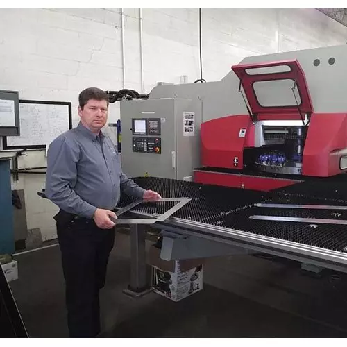 Operator Standing in front of a Press Brake Image