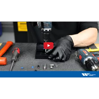 Hands Holding Tooling with Push Button Press Brake Tool Image