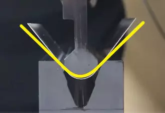 radius bending press brake tooling with metal sample showing springback