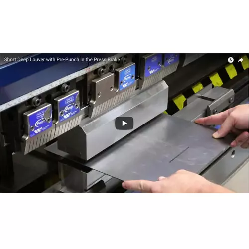 Hands Holding Metal Sample in Press Brake Image