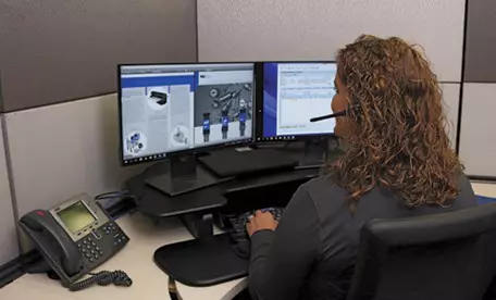 Wilson Tool tooling technician working on a computer