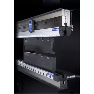Pressbrake with toolingin dramtic lighting on black background