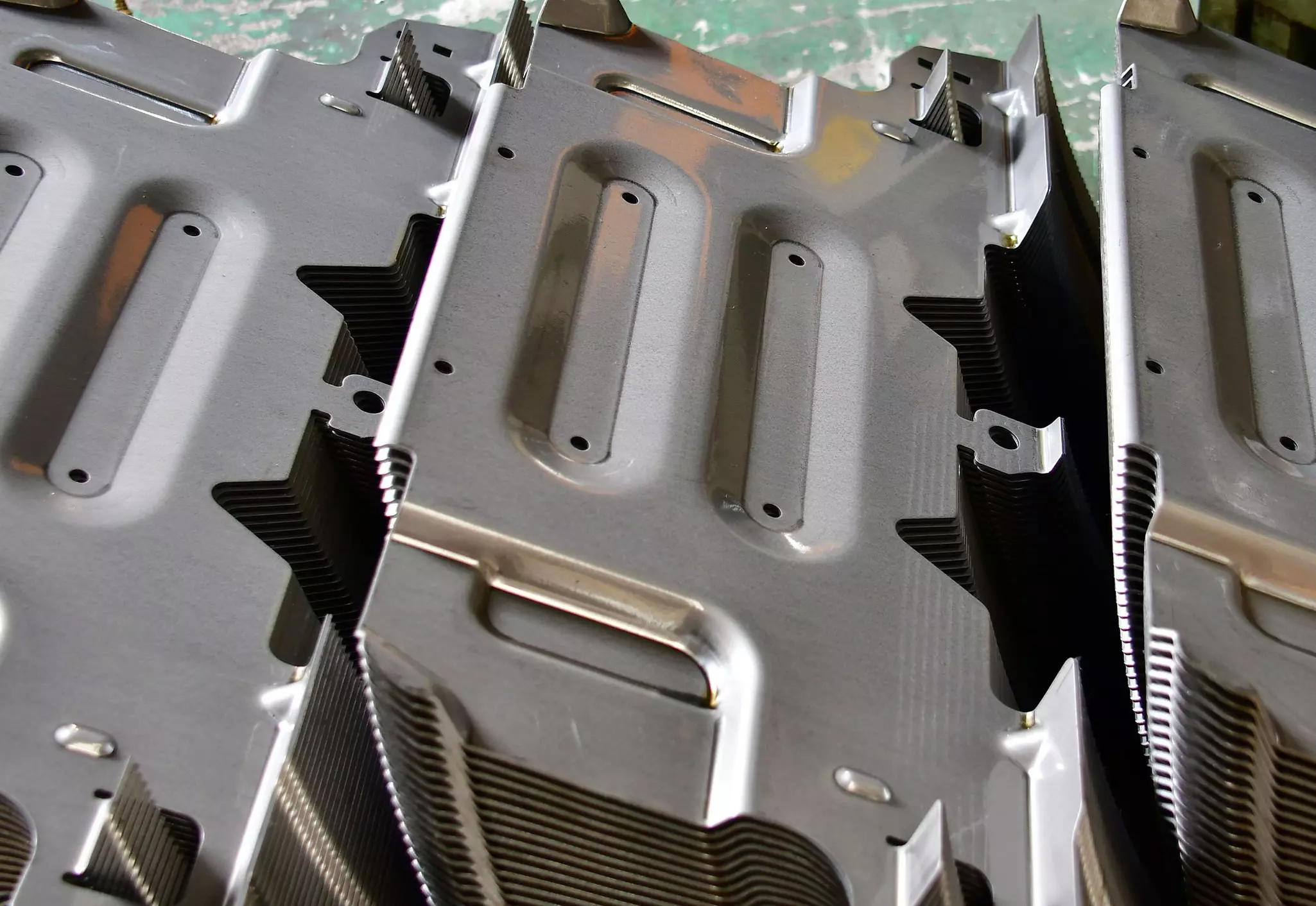 stacks of stamped auto body parts