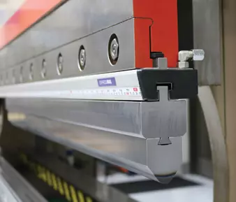 Dovetail style replaceable radius punch tip from Wilson Tool loaded in a press brake 